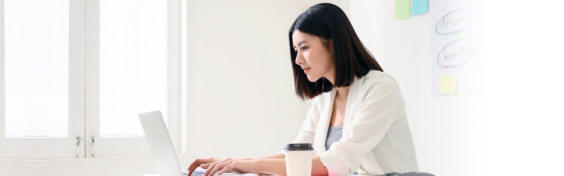 woman using her laptop