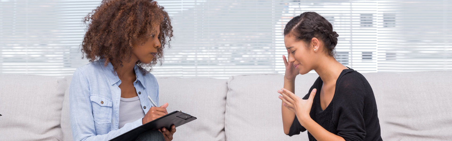 psychiatrist asking her patient